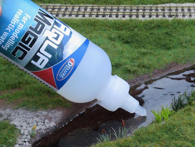 Deluxe Materials Aqua Magic voda 250ml čirá