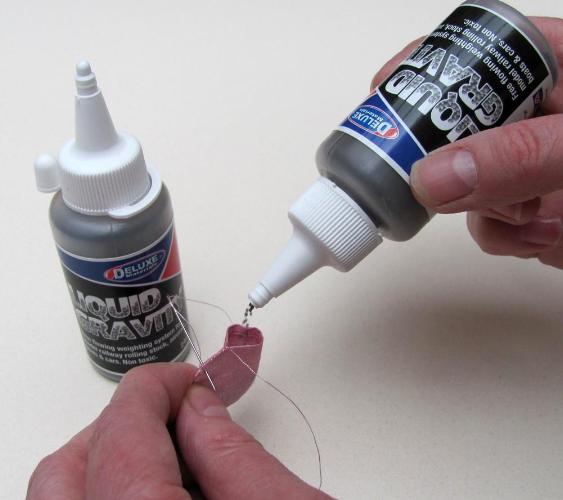 Deluxe Materials Liquid Gravity zátěž do modelu 240 g netoxická
